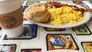 Scrambled Eggs with bacon & a side of potatoes